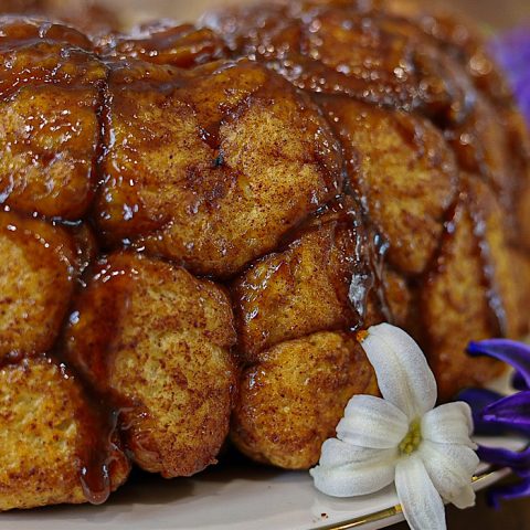 Sourdough Monkey Bread with white and purple flowers