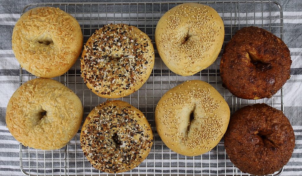 https://simpleisgourmet.com/wp-content/uploads/2021/03/sourdough-bagels-cooling-on-wire-rack-1024x597.jpg