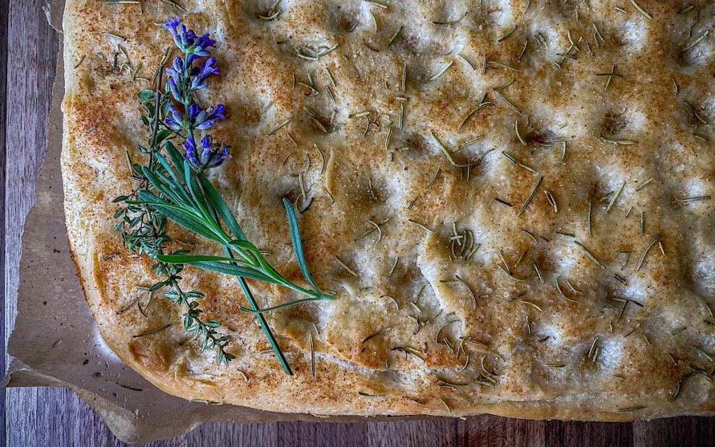 https://simpleisgourmet.com/wp-content/uploads/2021/09/Simple-Sourdough-Focaccia-bread-with-dimpled-rosemary-garlic-bread-1024x640.jpg