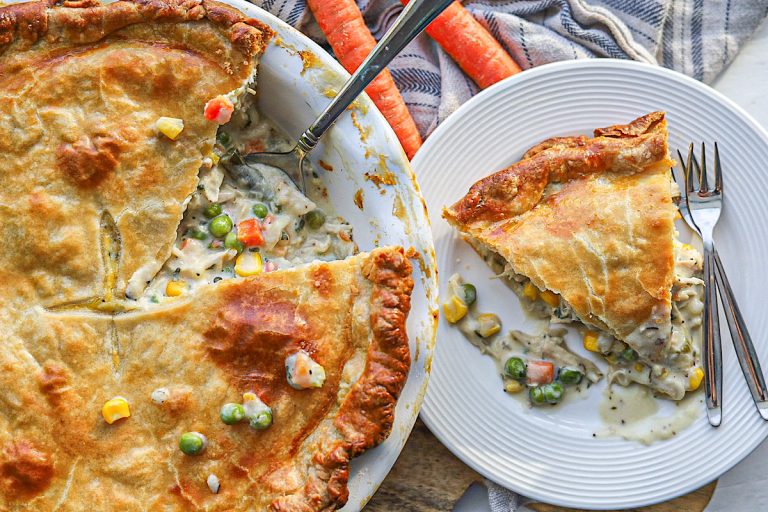 The best chicken pot pie on plate with forks sourdough crust simple is gourmet