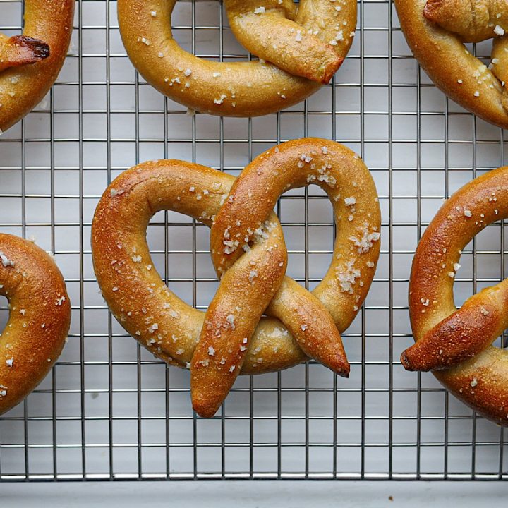 The best sourdough soft pretzels on wire rack