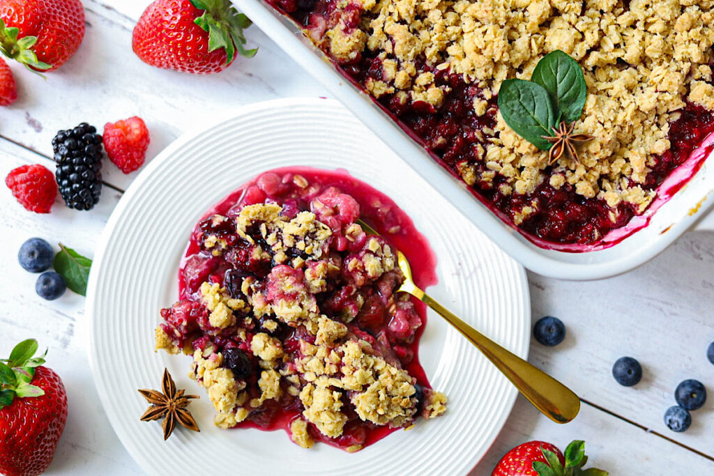 The Best Fruit Crisp Recipe on white plate simple is gourmet