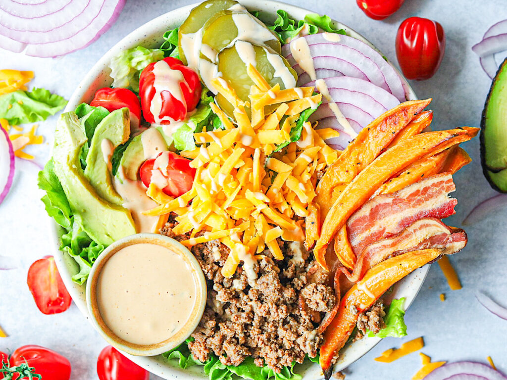 The Best Burger Bowls with Secret Sauce with bacon, avocado, cheese pickles simple is gourmet